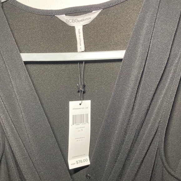BCBGeneration V-neck Surplice Romper in Black. Size Small. - Picture 11 of 11
